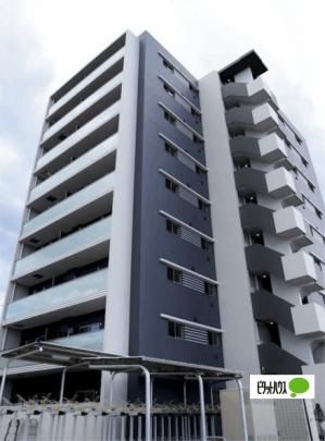 �����s������Z���P���ڂ̃}���V�����̌����O��