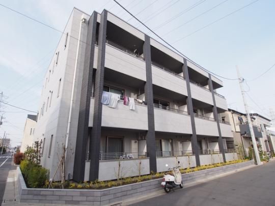 �����s������Z���Q���ڂ̃}���V�����̌����O��