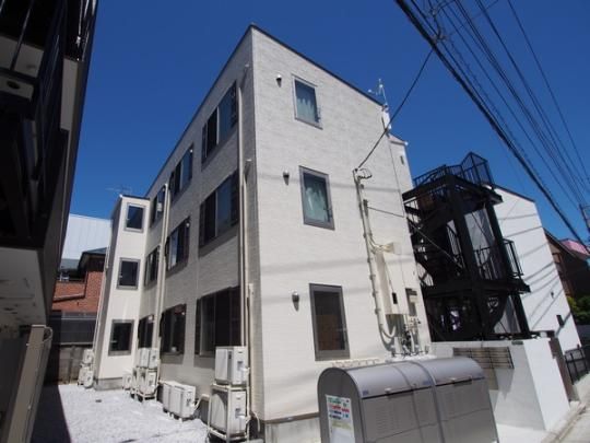 �����s������|�̒˂T���ڂ̃A�p�[�g�̌����O��